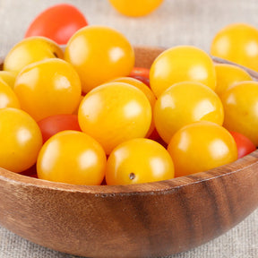 Egg tomato seeds from SeedsNow, indeterminate tomato plant with egg-shaped fruit, fresh seeds for home gardening.