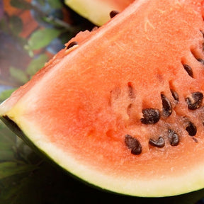 Black Diamond watermelon seeds from SeedsNow, showing vibrant seeds ideal for growing large, sweet watermelons.